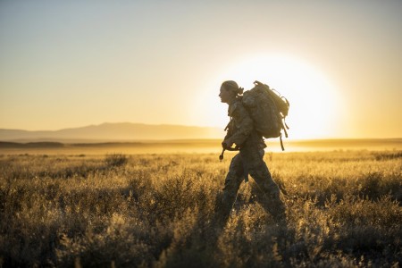 Idaho Army National Guard Staff Sgt. Lauren Cox completes an 11-mile ruck with a 40-pound weight in a pack during the Army National Guard Best Warrior Competition near Boise, Idaho, Sept. 16, 2023. During the competition, 15 Idaho National...