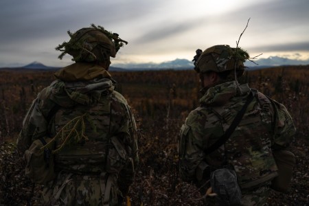 U.S. Army Soldiers from the 11th Infantry Airborne Division stand in front of the Alaska Mountain Range during a contact lane exercise at Delta Junction, Alaska, Sept. 29, 2023. Yudh Abhyas 2023 is a bilateral training exercise aimed at improving...