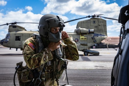 U.S. Army Sgt. Curtis Wright, a UH-60 Black Hawk helicopter repairer and crew chief assigned to Golf Company, 3rd Battalion, 126th Aviation Regiment, Hawaii Army National Guard, prepare for medevac operations during the Joint Pacific Multinational...