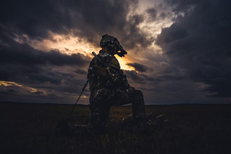 A Ranger assigned to the 75th Ranger Regiment controls the drop zone during airfield seizure training at Fort Moore, Ga. on Dec. 9, 2023. The 75th Ranger Regiment is the U.S. Army&#39;s premier special operations direct action raid force, and...