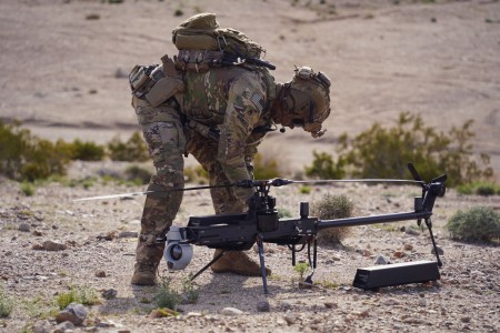 U.S. Army Staff Sgt. Stetson Manuel, a Robotics and Autonomous Systems platoon sergeant and infantryman, assigned to the Alpha Company, 1st Battalion, 29th Infantry Regiment, 316th Cavalry Brigade, assembles the Ghost-X Unmanned Aircraft System...