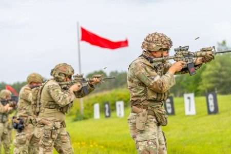 Oregon National Guard scout snipers fire their M4 rifles during the Winston P. Wilson Small Arms Championship at Camp Robinson in North Little Rock, Ark., May 1, 2024. The marksmanship competition pushed the soldiers through realistic rifle...