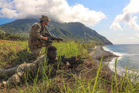 U.S. Army Sgt. Mariana Vincent and Spc. Wangae Popeh, assigned to 2nd Battalion, 27th Infantry Regiment, 3rd Infantry Brigade Combat Team, 25th Infantry Division, pull security during Exercise Balikatan 24 at the island of Batan, Philippines, May...