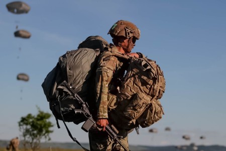 A U.S. Army paratrooper assigned to the 82nd Airborne Division rucks to an assembly area as a part of a joint forcible entry during Swift Response 24 at Luna, Romania, May 13, 2024. Swift Response 24 is linked to NATO’s Steadfast Defender 24,...