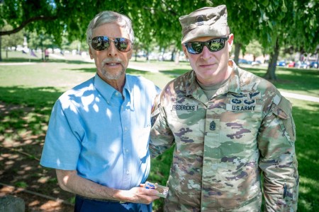 U.S. Army Command Sgt. Maj. Arthur Fredericks, the Connecticut National Guard&#39;s senior enlisted advisor, presents Mr. Rick Maynard a Connecticut World War I Campaign Medal in honor of his great-uncle&#39;s service with the 102nd Infantry...