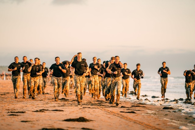 U.S. Army Rangers assigned to the 75th Ranger Regiment conduct Physical training on June 2, 2024, in honor of the Rangers who fought in Operation Overlord in Normandy, France. This year marks the 80th anniversary of D-Day.