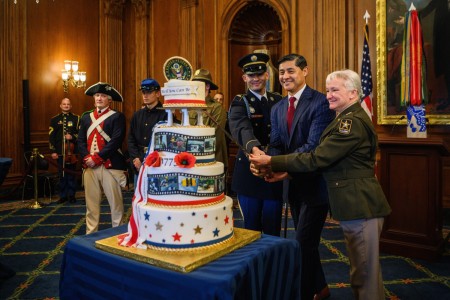 U.S. Army Pfc. Daniel Adams assigned to the 3rd Infantry Regiment (The Old Guard), Deputy Under Secretary of the Army Hon. Mario Diaz, and Director of the Army Staff, Lt. Gen. Laura Potter participate in the Army 249th Birthday cake-cutting...
