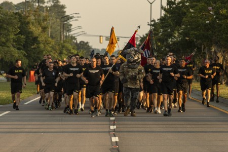 U.S. Army Maj. Gen. Christopher R. Norrie, left, and Command Sgt. Maj. Jonathan Reffeor, the 3rd Infantry Division command team, lead a division run to kick off Salute to Summer at Fort Stewart, Georgia.